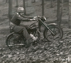 bob Smith Riding on motorcycle through woods